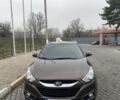 Коричневый Хендай их35, объемом двигателя 2 л и пробегом 185 тыс. км за 10615 $, фото 3 на Automoto.ua