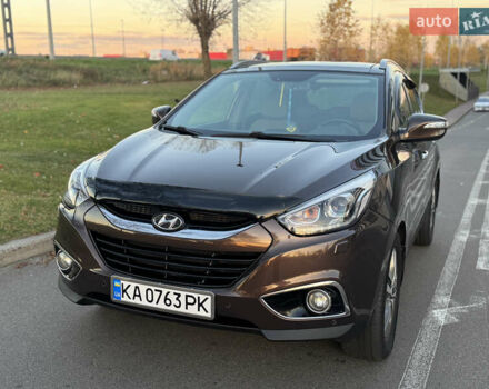 Коричневий Хендай іх35, об'ємом двигуна 2 л та пробігом 176 тис. км за 14500 $, фото 23 на Automoto.ua