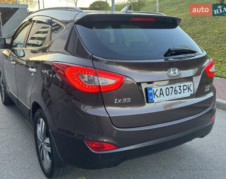 Коричневий Хендай іх35, об'ємом двигуна 2 л та пробігом 176 тис. км за 14500 $, фото 75 на Automoto.ua