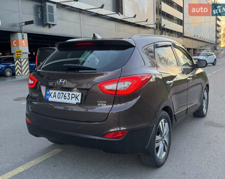 Коричневий Хендай іх35, об'ємом двигуна 2 л та пробігом 176 тис. км за 14500 $, фото 69 на Automoto.ua