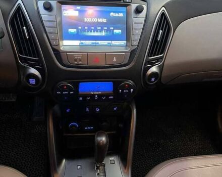 Коричневий Хендай іх35, об'ємом двигуна 2 л та пробігом 176 тис. км за 13700 $, фото 13 на Automoto.ua