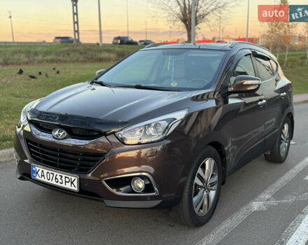Коричневий Хендай іх35, об'ємом двигуна 2 л та пробігом 176 тис. км за 14500 $, фото 21 на Automoto.ua