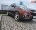 Коричневий Хендай іх35, об'ємом двигуна 2 л та пробігом 176 тис. км за 13700 $, фото 4 на Automoto.ua