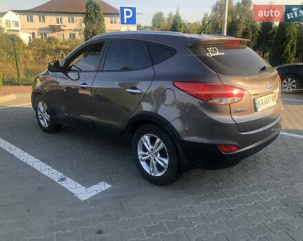 Коричневий Хендай іх35, об'ємом двигуна 2 л та пробігом 191 тис. км за 12500 $, фото 6 на Automoto.ua