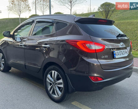 Коричневий Хендай іх35, об'ємом двигуна 2 л та пробігом 176 тис. км за 14500 $, фото 76 на Automoto.ua