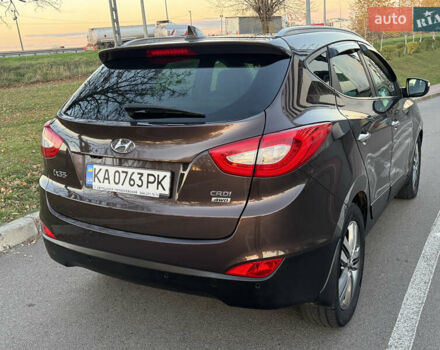 Коричневий Хендай іх35, об'ємом двигуна 2 л та пробігом 176 тис. км за 14500 $, фото 6 на Automoto.ua