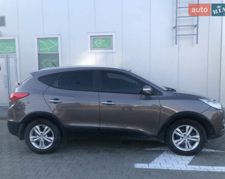 Коричневий Хендай іх35, об'ємом двигуна 2 л та пробігом 191 тис. км за 12500 $, фото 3 на Automoto.ua