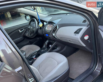 Коричневий Хендай іх35, об'ємом двигуна 2 л та пробігом 176 тис. км за 14500 $, фото 61 на Automoto.ua