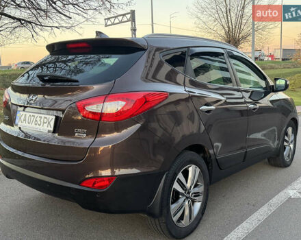 Коричневий Хендай іх35, об'ємом двигуна 2 л та пробігом 176 тис. км за 14500 $, фото 7 на Automoto.ua