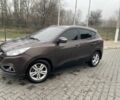 Коричневый Хендай их35, объемом двигателя 2 л и пробегом 185 тыс. км за 10615 $, фото 1 на Automoto.ua