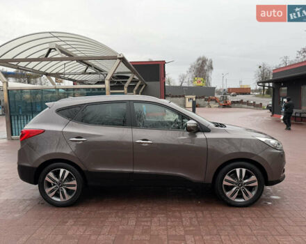 Коричневий Хендай іх35, об'ємом двигуна 2 л та пробігом 230 тис. км за 14300 $, фото 12 на Automoto.ua