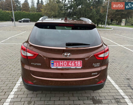 Коричневий Хендай іх35, об'ємом двигуна 2 л та пробігом 211 тис. км за 17400 $, фото 22 на Automoto.ua