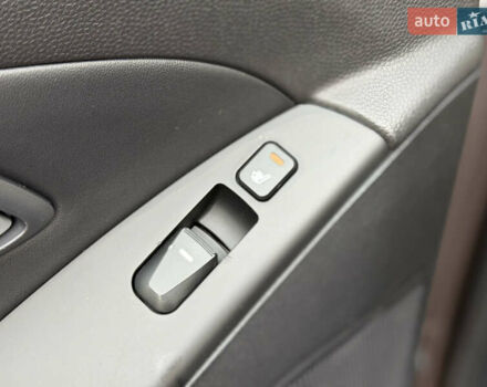 Коричневий Хендай іх35, об'ємом двигуна 2 л та пробігом 230 тис. км за 15300 $, фото 27 на Automoto.ua