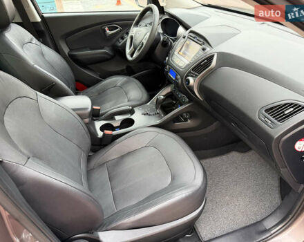 Коричневий Хендай іх35, об'ємом двигуна 2 л та пробігом 230 тис. км за 15300 $, фото 64 на Automoto.ua