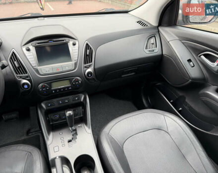 Коричневий Хендай іх35, об'ємом двигуна 2 л та пробігом 230 тис. км за 14300 $, фото 62 на Automoto.ua