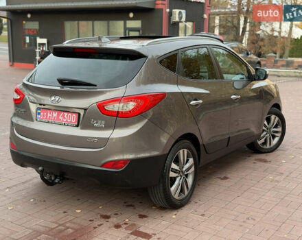 Коричневий Хендай іх35, об'ємом двигуна 2 л та пробігом 230 тис. км за 15300 $, фото 54 на Automoto.ua