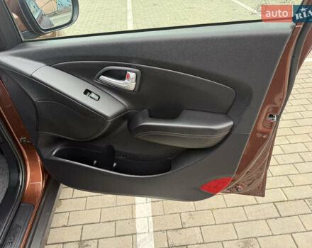 Коричневий Хендай іх35, об'ємом двигуна 2 л та пробігом 211 тис. км за 17400 $, фото 65 на Automoto.ua