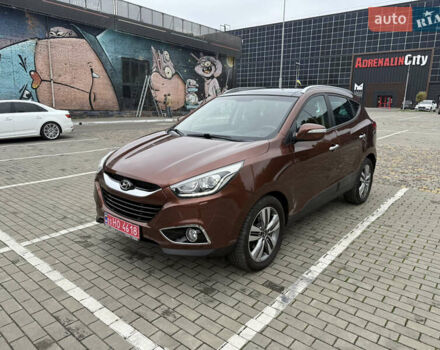 Коричневий Хендай іх35, об'ємом двигуна 2 л та пробігом 211 тис. км за 17400 $, фото 1 на Automoto.ua