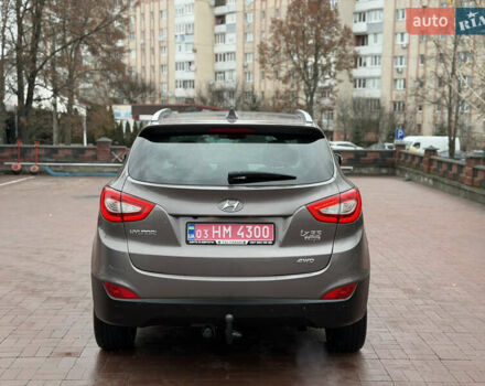 Коричневий Хендай іх35, об'ємом двигуна 2 л та пробігом 230 тис. км за 14300 $, фото 73 на Automoto.ua