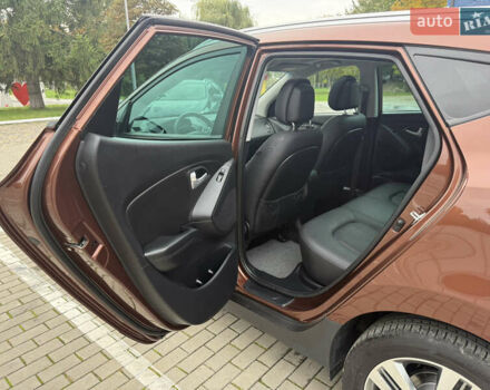 Коричневий Хендай іх35, об'ємом двигуна 2 л та пробігом 211 тис. км за 17400 $, фото 81 на Automoto.ua