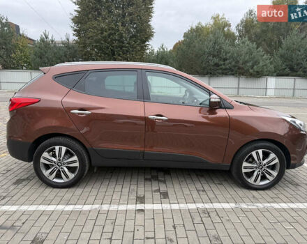 Коричневий Хендай іх35, об'ємом двигуна 2 л та пробігом 211 тис. км за 17400 $, фото 16 на Automoto.ua