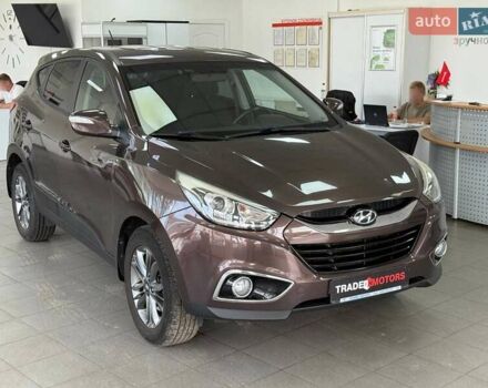 Коричневий Хендай іх35, об'ємом двигуна 2 л та пробігом 155 тис. км за 12990 $, фото 1 на Automoto.ua