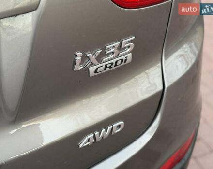 Коричневий Хендай іх35, об'ємом двигуна 2 л та пробігом 230 тис. км за 15300 $, фото 11 на Automoto.ua