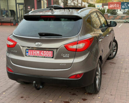 Коричневий Хендай іх35, об'ємом двигуна 2 л та пробігом 230 тис. км за 15300 $, фото 57 на Automoto.ua