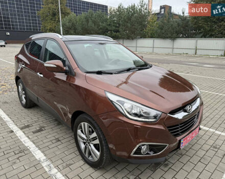 Коричневий Хендай іх35, об'ємом двигуна 2 л та пробігом 211 тис. км за 17400 $, фото 11 на Automoto.ua