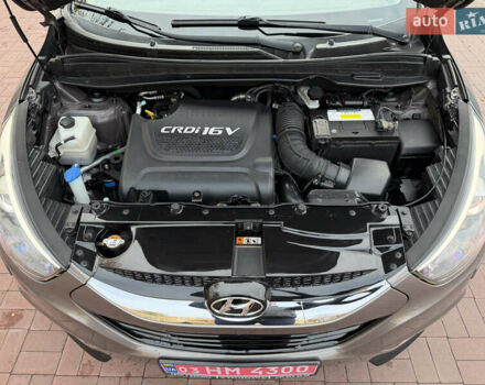 Коричневий Хендай іх35, об'ємом двигуна 2 л та пробігом 230 тис. км за 15300 $, фото 49 на Automoto.ua