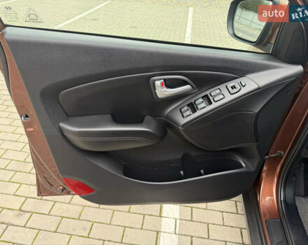 Коричневий Хендай іх35, об'ємом двигуна 2 л та пробігом 211 тис. км за 17400 $, фото 97 на Automoto.ua