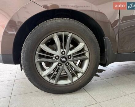Коричневий Хендай іх35, об'ємом двигуна 2 л та пробігом 155 тис. км за 12990 $, фото 32 на Automoto.ua