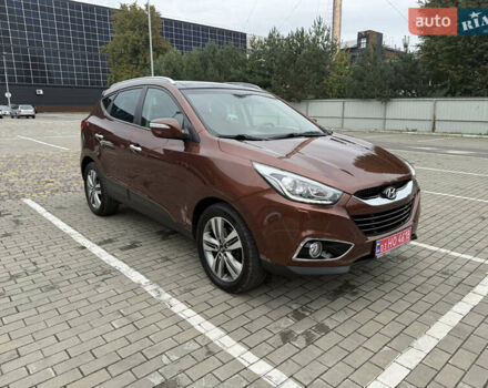 Коричневий Хендай іх35, об'ємом двигуна 2 л та пробігом 211 тис. км за 17400 $, фото 10 на Automoto.ua