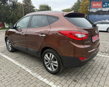 Коричневий Хендай іх35, об'ємом двигуна 2 л та пробігом 211 тис. км за 17400 $, фото 14 на Automoto.ua