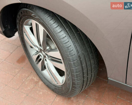 Коричневий Хендай іх35, об'ємом двигуна 2 л та пробігом 230 тис. км за 14300 $, фото 55 на Automoto.ua