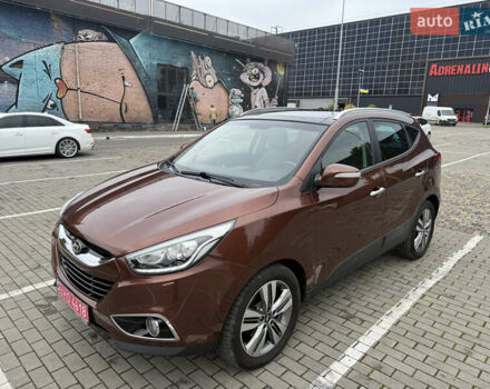 Коричневий Хендай іх35, об'ємом двигуна 2 л та пробігом 211 тис. км за 17400 $, фото 9 на Automoto.ua