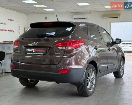 Коричневий Хендай іх35, об'ємом двигуна 2 л та пробігом 155 тис. км за 12990 $, фото 13 на Automoto.ua