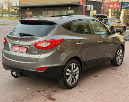 Коричневий Хендай іх35, об'ємом двигуна 2 л та пробігом 230 тис. км за 15300 $, фото 3 на Automoto.ua