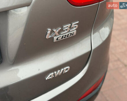 Коричневий Хендай іх35, об'ємом двигуна 2 л та пробігом 230 тис. км за 14300 $, фото 11 на Automoto.ua