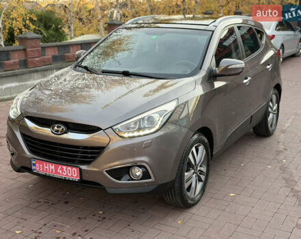 Коричневий Хендай іх35, об'ємом двигуна 2 л та пробігом 230 тис. км за 15300 $, фото 6 на Automoto.ua