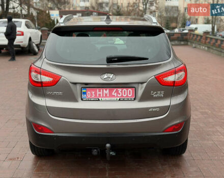 Коричневий Хендай іх35, об'ємом двигуна 2 л та пробігом 230 тис. км за 14300 $, фото 5 на Automoto.ua