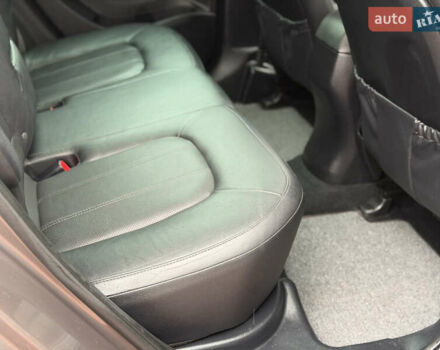 Коричневий Хендай іх35, об'ємом двигуна 2 л та пробігом 230 тис. км за 14300 $, фото 29 на Automoto.ua