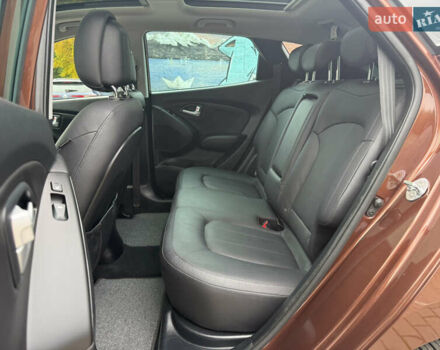 Коричневий Хендай іх35, об'ємом двигуна 2 л та пробігом 211 тис. км за 17400 $, фото 87 на Automoto.ua