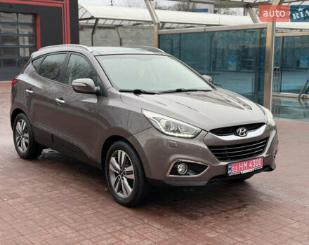 Коричневий Хендай іх35, об'ємом двигуна 2 л та пробігом 230 тис. км за 14300 $, фото 1 на Automoto.ua