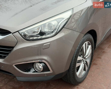 Коричневий Хендай іх35, об'ємом двигуна 2 л та пробігом 230 тис. км за 14300 $, фото 15 на Automoto.ua