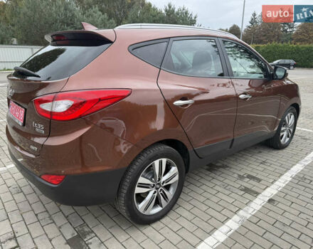 Коричневий Хендай іх35, об'ємом двигуна 2 л та пробігом 211 тис. км за 17400 $, фото 18 на Automoto.ua