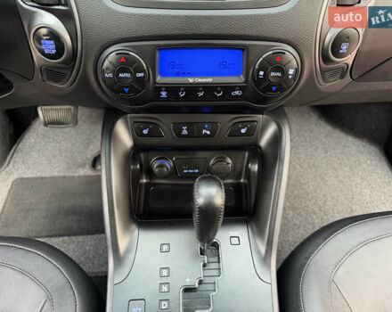 Коричневий Хендай іх35, об'ємом двигуна 2 л та пробігом 230 тис. км за 15300 $, фото 45 на Automoto.ua