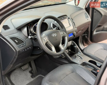 Коричневий Хендай іх35, об'ємом двигуна 2 л та пробігом 230 тис. км за 15300 $, фото 17 на Automoto.ua