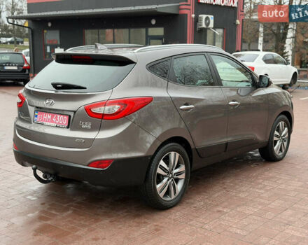 Коричневий Хендай іх35, об'ємом двигуна 2 л та пробігом 230 тис. км за 14300 $, фото 3 на Automoto.ua