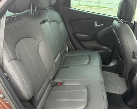 Коричневий Хендай іх35, об'ємом двигуна 2 л та пробігом 211 тис. км за 17400 $, фото 78 на Automoto.ua